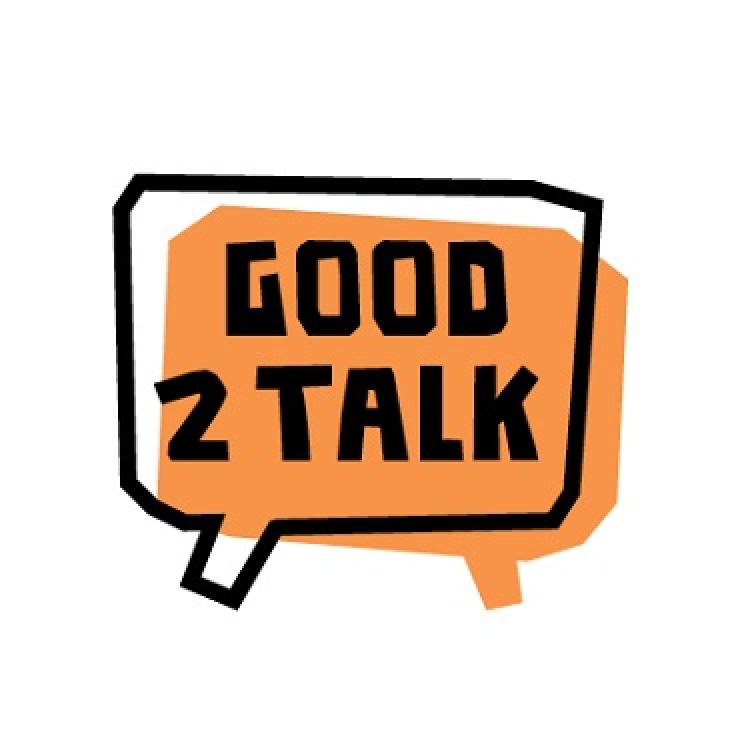 In the background is a solid coloured orange speech bubble. A black outline of a speech bubble is layered in front of the orange speech bubble. In the centre is the text "Good 2 Talk" in black uppercase font.