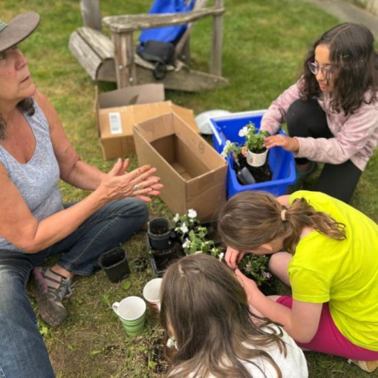 Children planting flowers