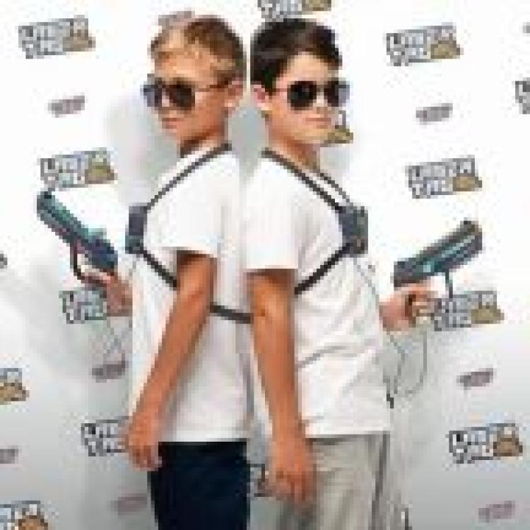 Two boys with laser tag gear