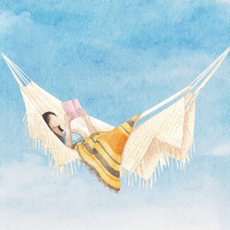 A woman reading in a hammock