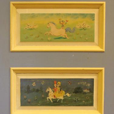 Image of a section of a door painted in the style of Walter Trier. The door is painted light blue and has two rectangular panels. The top panel has a beige border with a painting of cherub riding a white horse with blue main and tail in the foreground and a green background with two trees and small plants. The lower panel has a beige border with a painting of a man and woman riding a white horse in the foreground with a dark blue and green gradient background mimicking the sky and grass.