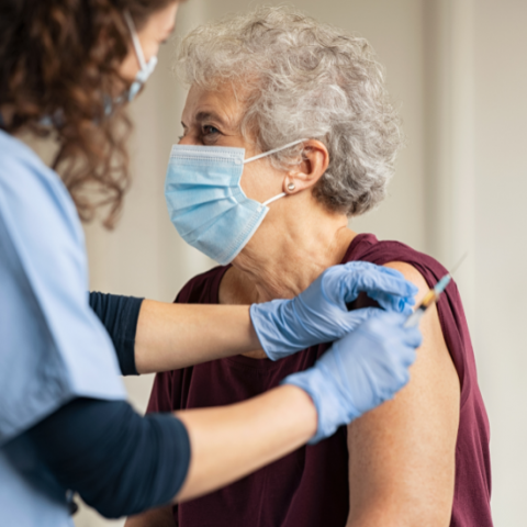 Senior getting vaccinated