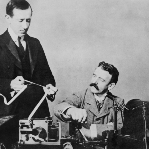 Guglielmo Marconi examining first wireless signals across the Atlantic.