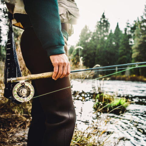 Picture of fly fishing pole and a river