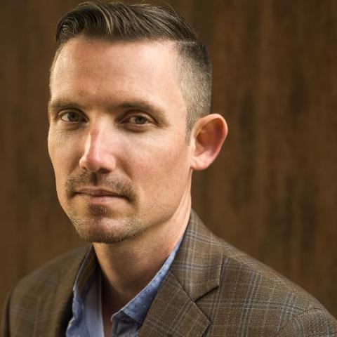 Headshot of Ira Wells